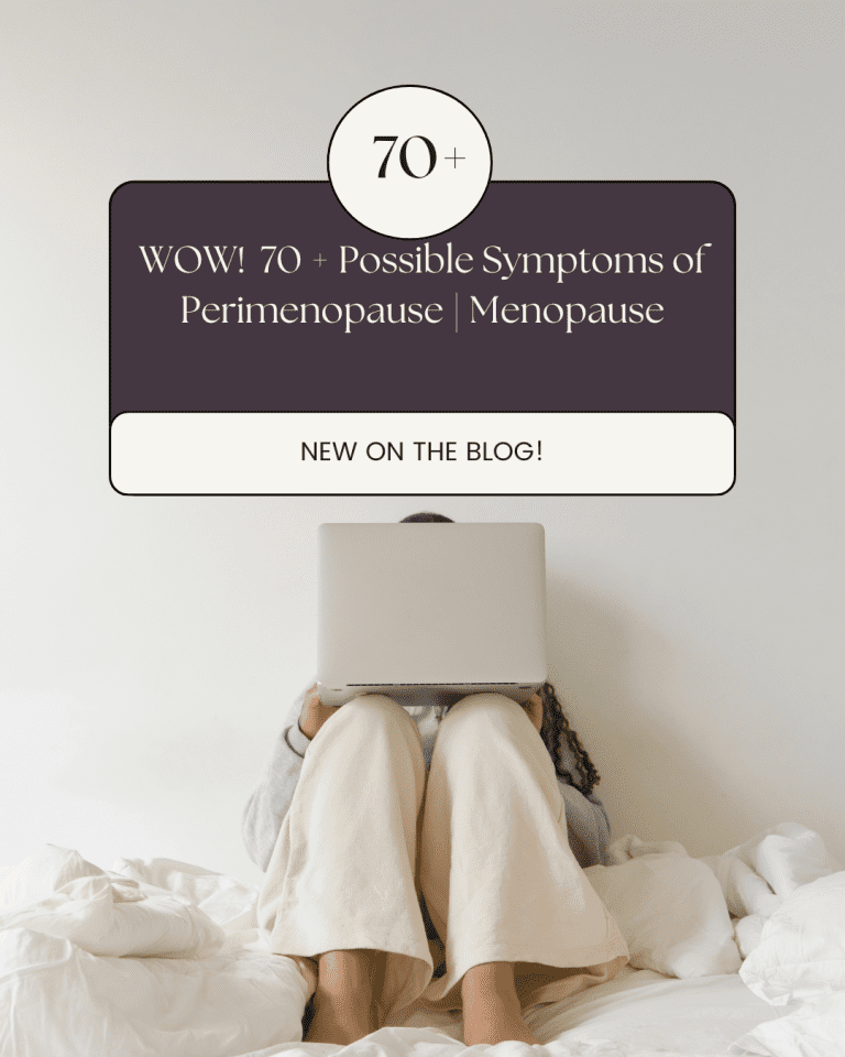 Woman sitting on bed with a laptop reviewing symptoms of perimenopause and menopause